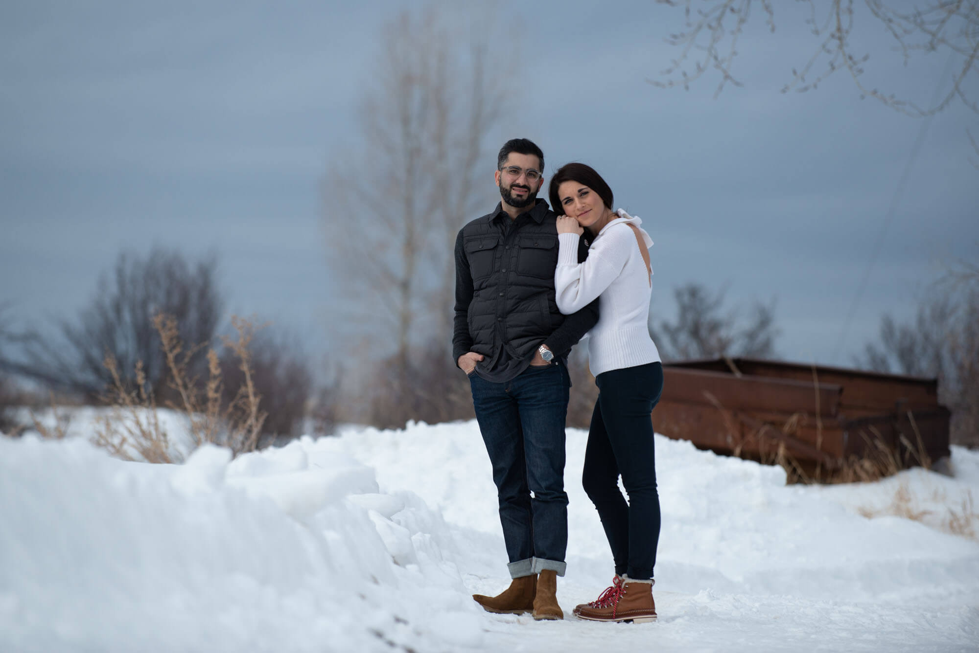 photo of a couple in the snow taken by Aspen photographer Michele Cardamone