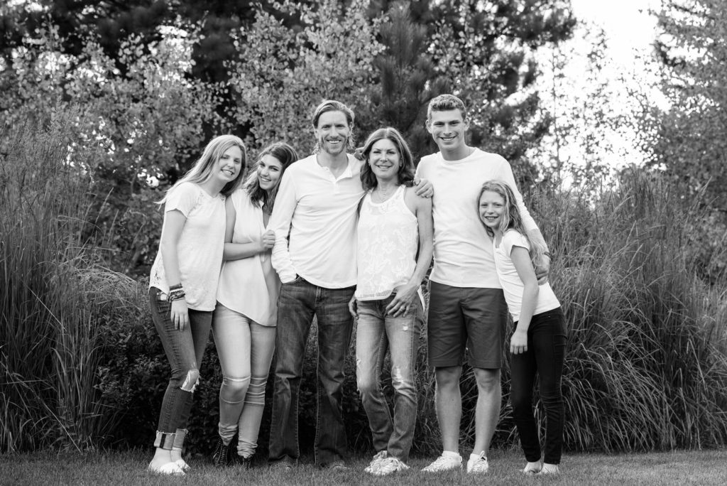 black and white family portrait taken by Michele Cardamone