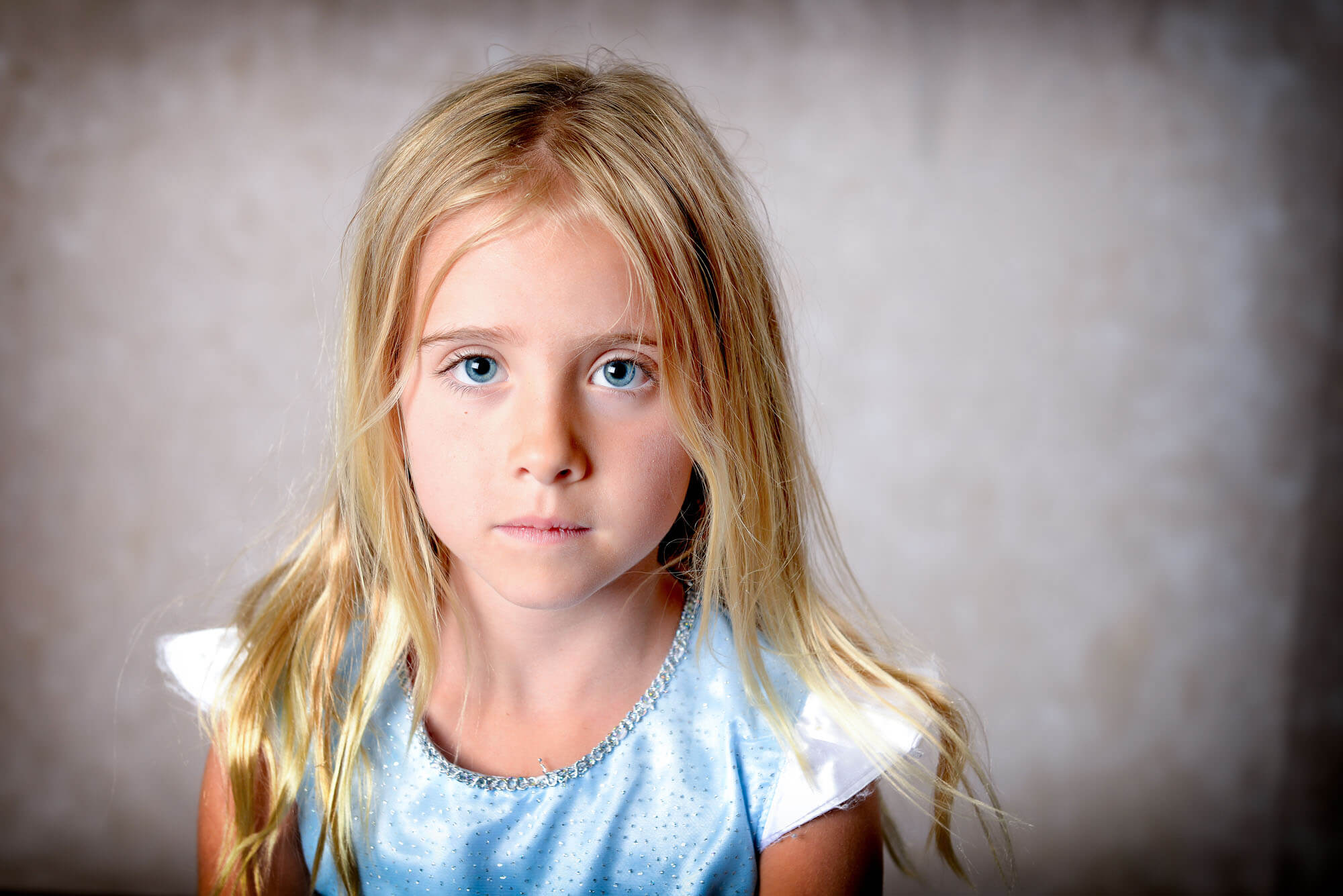 portrait of a little girl in a studio